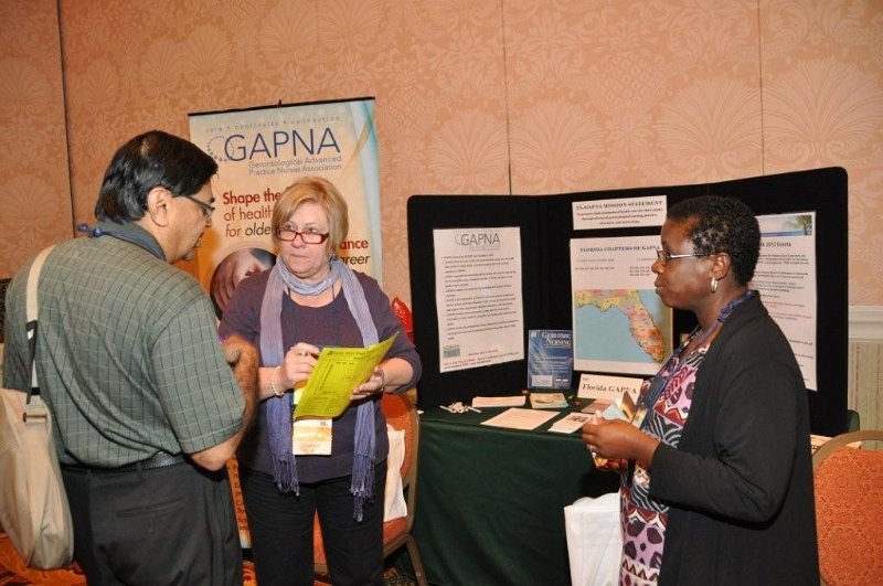 FMDA- Oct. 2011 032.jpg - Jo Ann Fisher (center), president of FL-GAPNA, speaks to attendees at this year’s trade show.